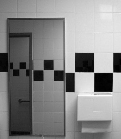 Fineness of bathroom finishing in black and white color scheme